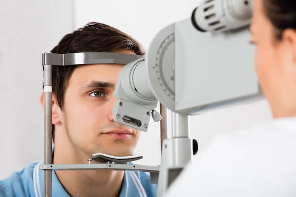 A person getting his eyes check