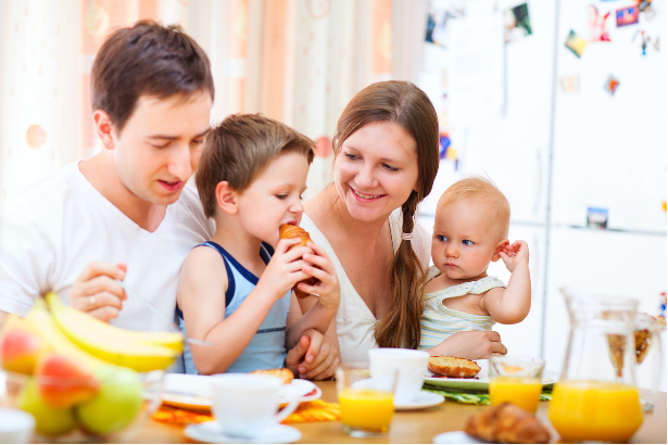 Young family eating health foods for breakfast
