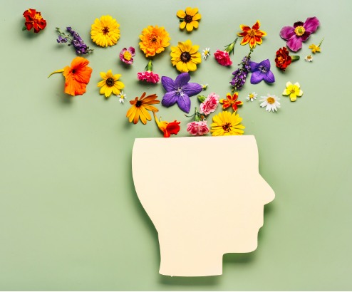 Beautiful flowers on head Representing Mental Health - Brevard Health Alliance 