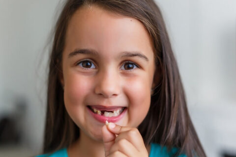 Cute Girl with a broken tooth - Brevard Health Alliance