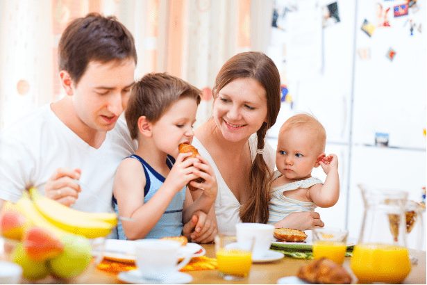 Happy and healthy family having breakfast at their home Brevard County, Florida